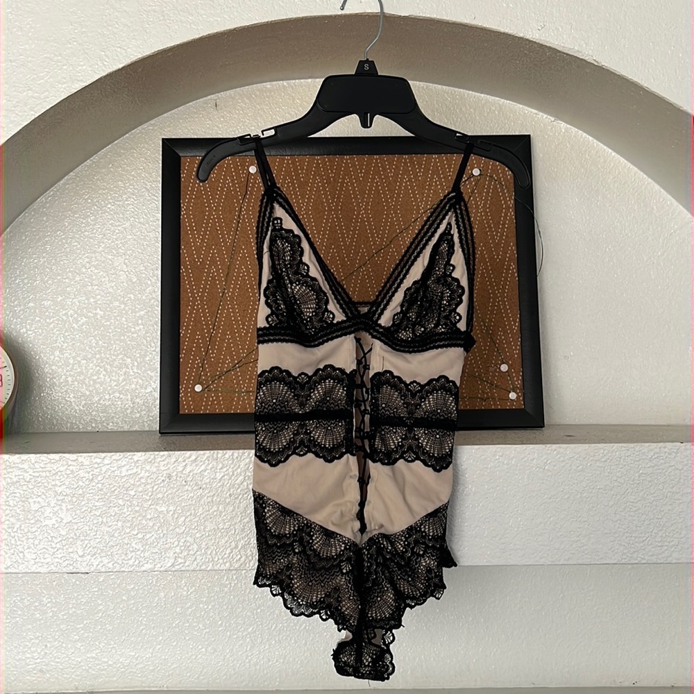 Tan and black lace bodysuit